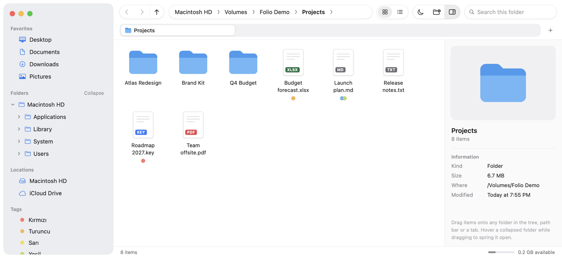 Icon view in light mode showing colored Finder tags